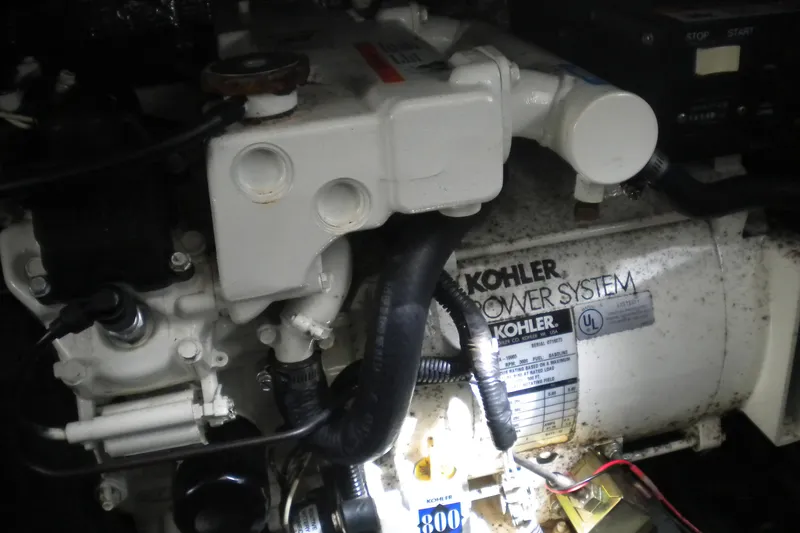 Slide: The Image of Kohler power system in 2002 Sea Ray 280 Sundancer boat engine compartment. - 52