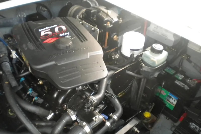 Slide: The Image of Engine compartment of a 2002 Sea Ray 280 Sundancer with MerCruiser 5.0 MPI engine. - 55
