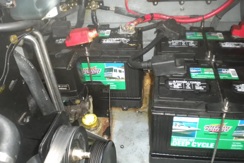 Slide: The Image of Marine deep cycle batteries in a 2002 Sea Ray Sundancer 280 engine compartment. - 58
