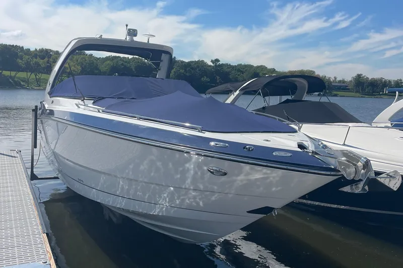 The Image of 2018 Monterey 328 Super Sport boat docked on a sunny day. - 1