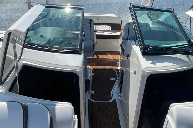 Slide: The Image of 2018 Monterey 328 Super Sport boat interior with open cockpit and seating area. - 23