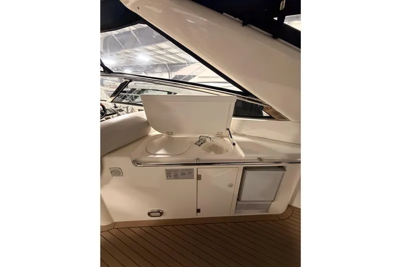 Slide: The Image of 1997 Sunseeker Camargue 51 yacht interior with sink and storage area. - 10
