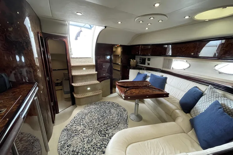 Slide: The Image of Luxurious interior of a 1997 Sunseeker Camargue 51 yacht with elegant seating and decor. - 16