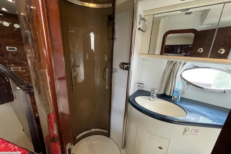 Slide: The Image of Bathroom interior of 1997 Sunseeker Camargue 51 yacht with shower and sink. - 18