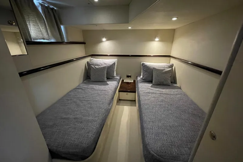 Slide: The Image of Interior of 1997 Sunseeker Camargue 51 yacht with twin beds and modern lighting. - 21