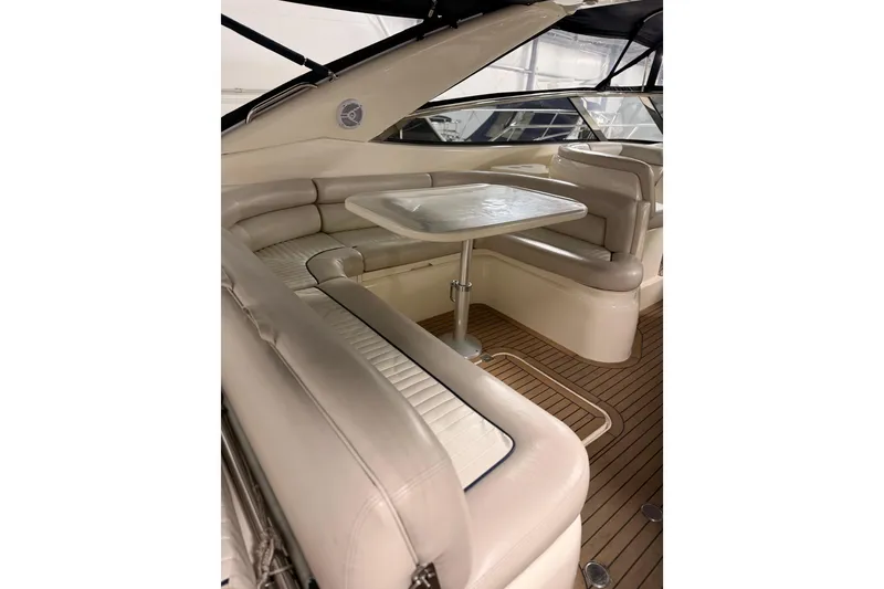 Slide: The Image of Luxurious interior of 1997 Sunseeker Camargue 51 yacht with elegant seating and table. - 7