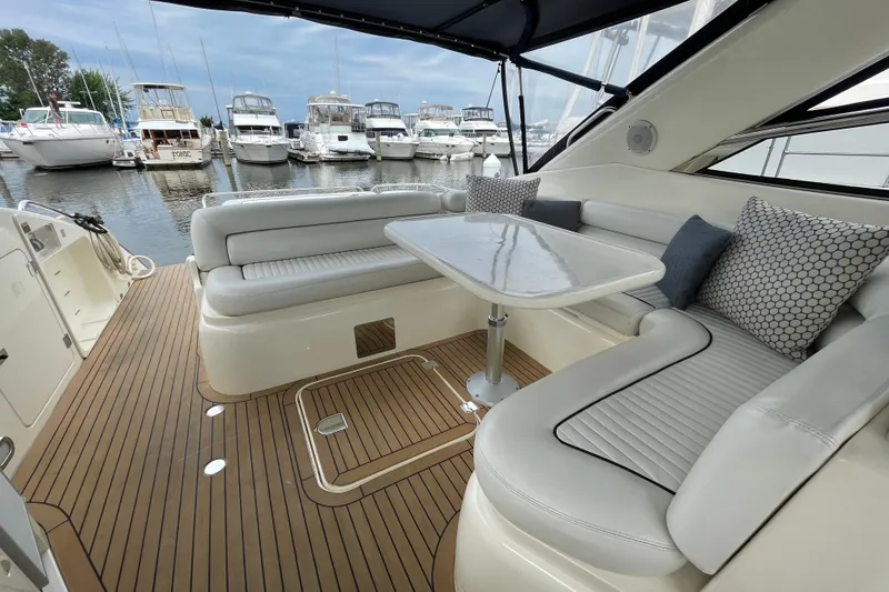 Slide: The Image of Luxurious 1997 Sunseeker Camargue 51 yacht interior with elegant seating and table. - 8