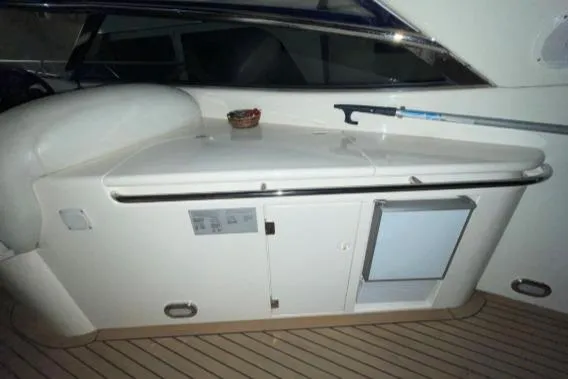 Slide: The Image of 1997 Sunseeker Camargue 51 yacht interior with sleek cabinetry and modern design. - 9