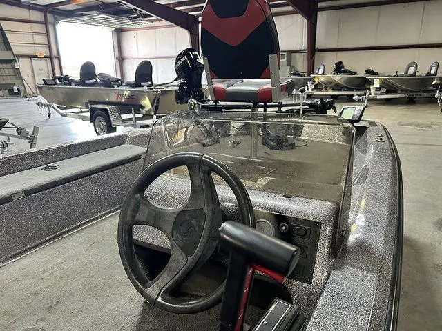 Slide: The Image of Basstream 1550 boat, 2021 model, inside a warehouse. - 6