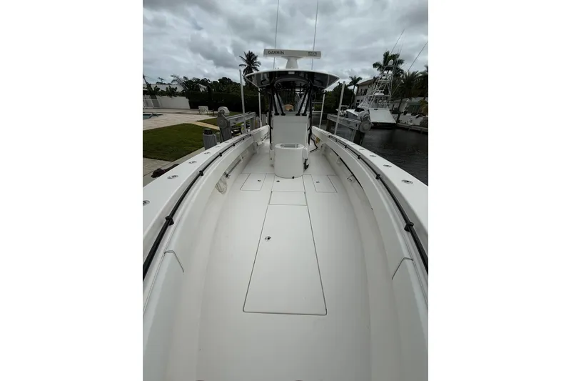 Slide: The Image of 2020 Contender 39 ST boat interior with spacious deck and modern equipment. - 16
