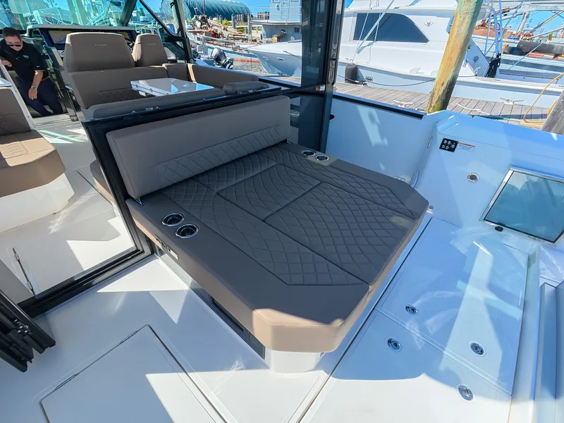 Slide: The Image of The image shows the cockpit of a 2027 Saxdor 400 GTO with a cushioned lounging area. - 5