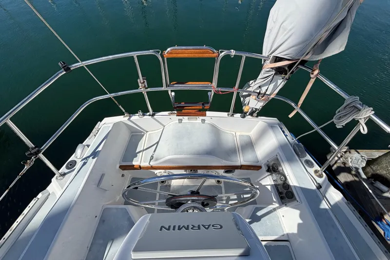 Slide: The Image of Cockpit of a 1988 Catalina 34 sailboat with Garmin navigation equipment. - 33