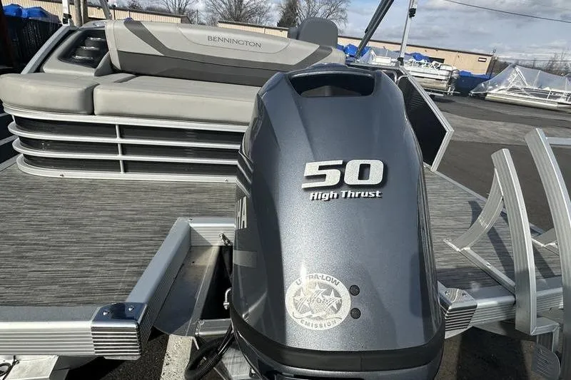 Slide: The Image of 2023 Bennington 22 SX Swingback with Yamaha 50 High Thrust engine, docked outdoors. - 10