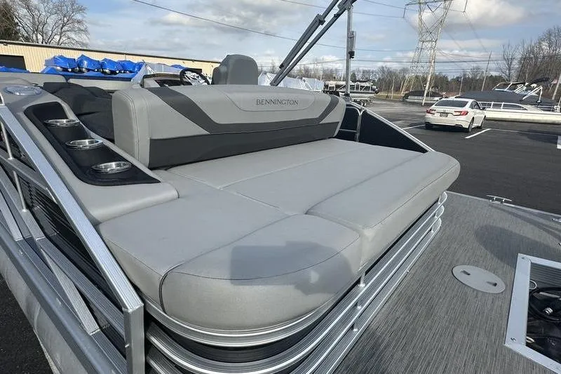 Slide: The Image of 2023 Bennington 22 SX Swingback pontoon boat with spacious seating and sleek design. - 15