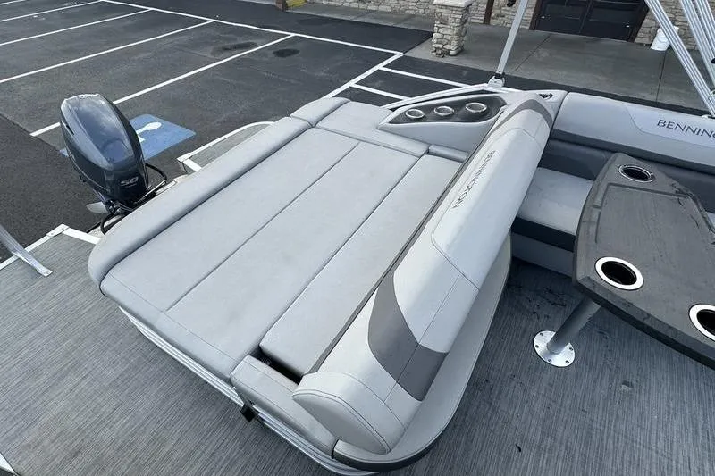 Slide: The Image of 2023 Bennington 22 SX Swingback boat with spacious seating and modern design. - 21