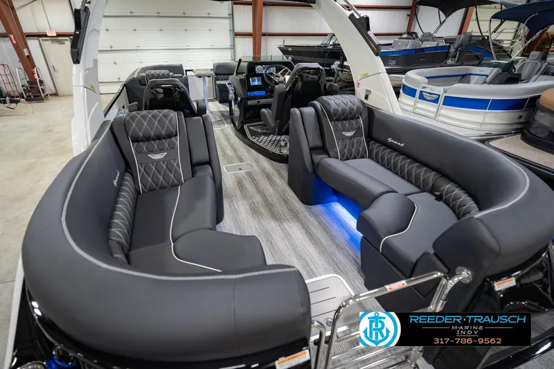 Slide: The Image of Luxurious interior of 2026 Bennington QX 25 QXFBA pontoon boat with elegant seating. - 15
