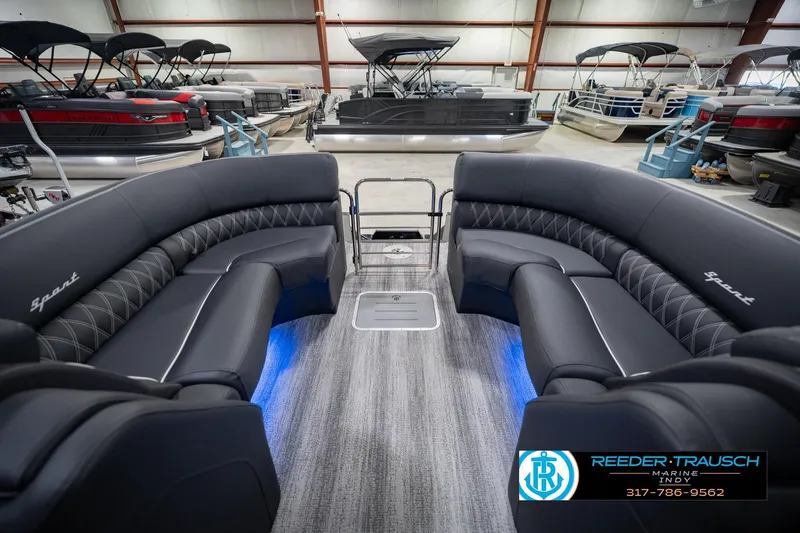 Slide: The Image of Luxurious interior of 2026 Bennington QX 25 QXFBA pontoon boat in showroom. - 18