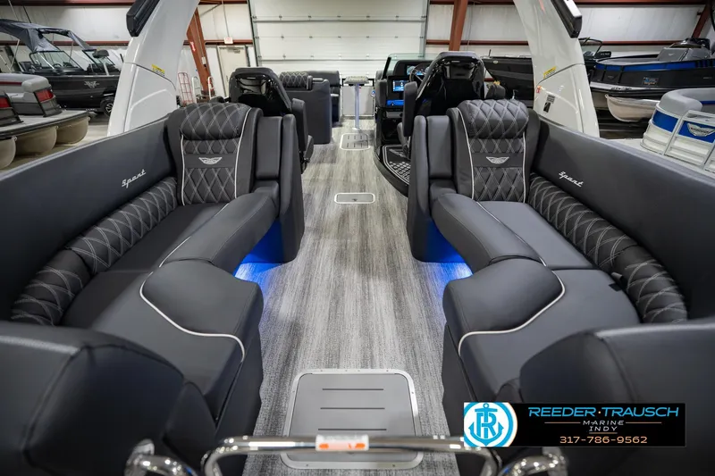 Slide: The Image of Luxurious interior of 2026 Bennington QX 25 QXFBA pontoon boat with plush seating. - 19