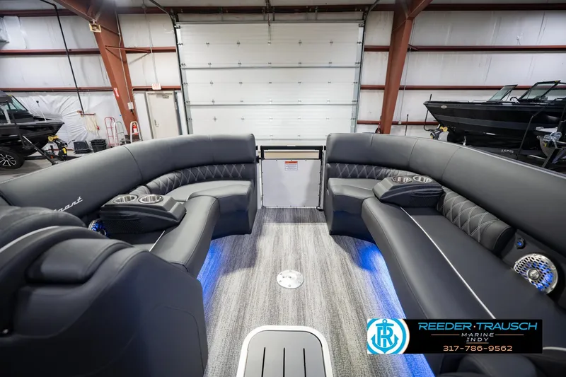 Slide: The Image of Luxurious interior of 2026 Bennington QX 25 QXFBA pontoon boat in showroom. - 22