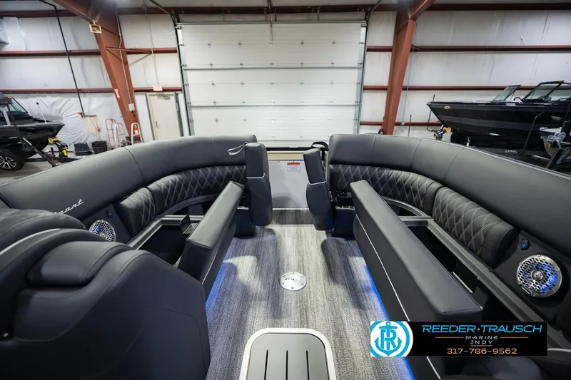 Slide: The Image of Luxurious interior of 2026 Bennington QX 25 QXFBA pontoon boat in showroom. - 23