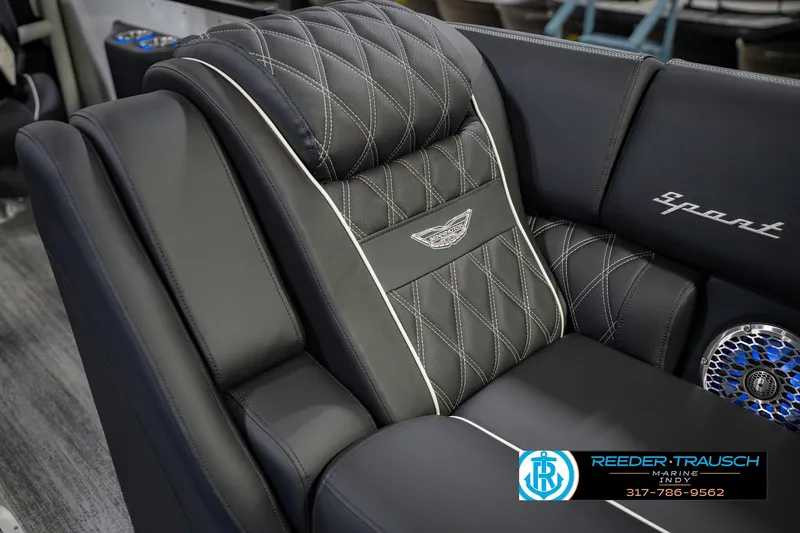 Slide: The Image of Luxurious seating in 2026 Bennington QX 25 QXFBA boat with elegant stitching and logo. - 24