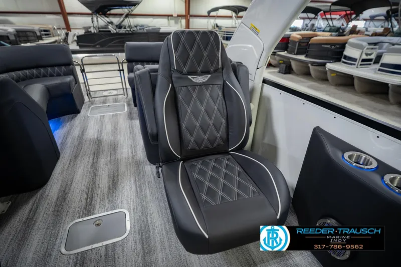 Slide: The Image of 2026 Bennington QX 25 QXFBA luxury boat interior with premium seating and modern design. - 26