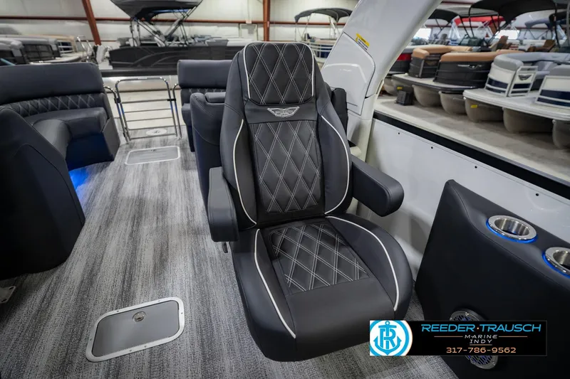 Slide: The Image of Luxurious interior of 2026 Bennington QX 25 QXFBA pontoon boat with premium seating. - 27
