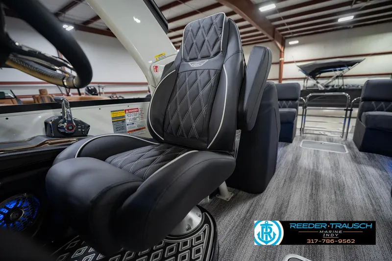 Slide: The Image of Luxurious interior of 2026 Bennington QX 25 QXFBA boat with premium seating. - 35