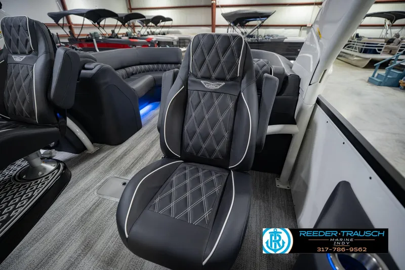 Slide: The Image of Luxurious interior of 2026 Bennington QX 25 QXFBA pontoon boat with premium seating. - 37