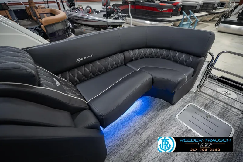 Slide: The Image of Luxurious seating on 2026 Bennington QX 25 QXFBA pontoon boat with blue LED lighting. - 38