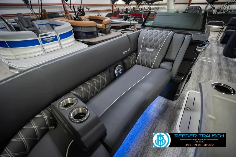 Slide: The Image of Luxurious interior of 2026 Bennington QX 25 QXFBA pontoon boat with plush seating. - 39