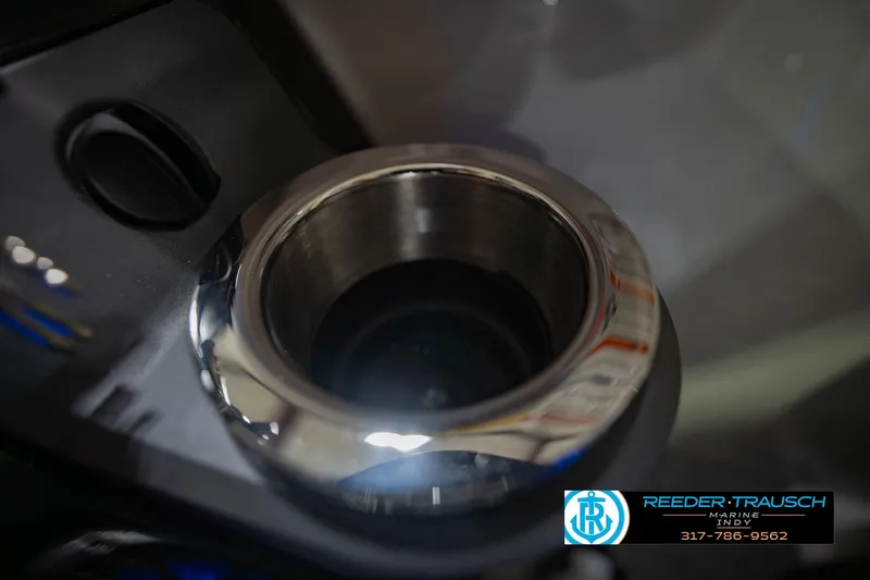 Slide: The Image of Close-up of a 2026 Bennington QX 25 QXFBA cup holder with chrome finish. - 42