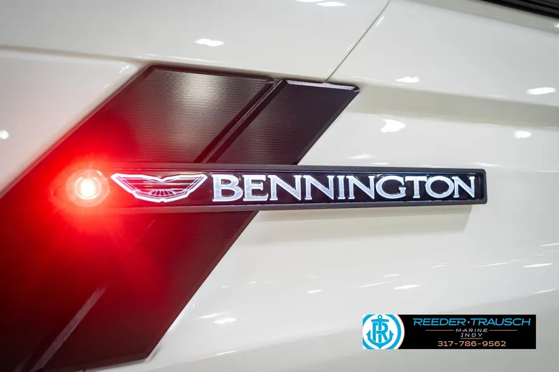 Slide: The Image of 2026 Bennington QX 25 QXFBA logo with red light, Reeder-Trausch Marine branding. - 47