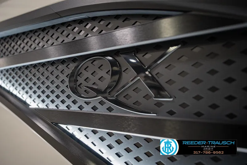 Slide: The Image of 2026 Bennington QX 25 QXFBA grille with sleek, modern design and branding details. - 54