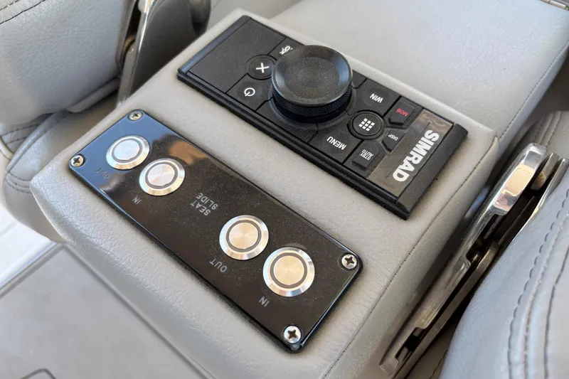 Slide: The Image of Control panel of 2024 Sea Pro 322 Offshore boat with Simrad navigation system. - 27