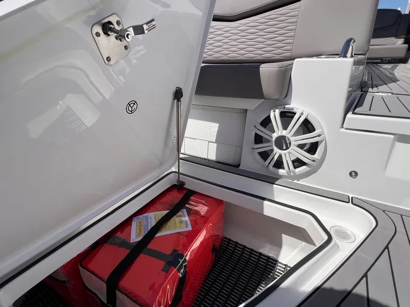 Slide: The Image of Storage compartment in 2019 Cruisers Yachts 338 CX South Beach Bow Rider. - 19