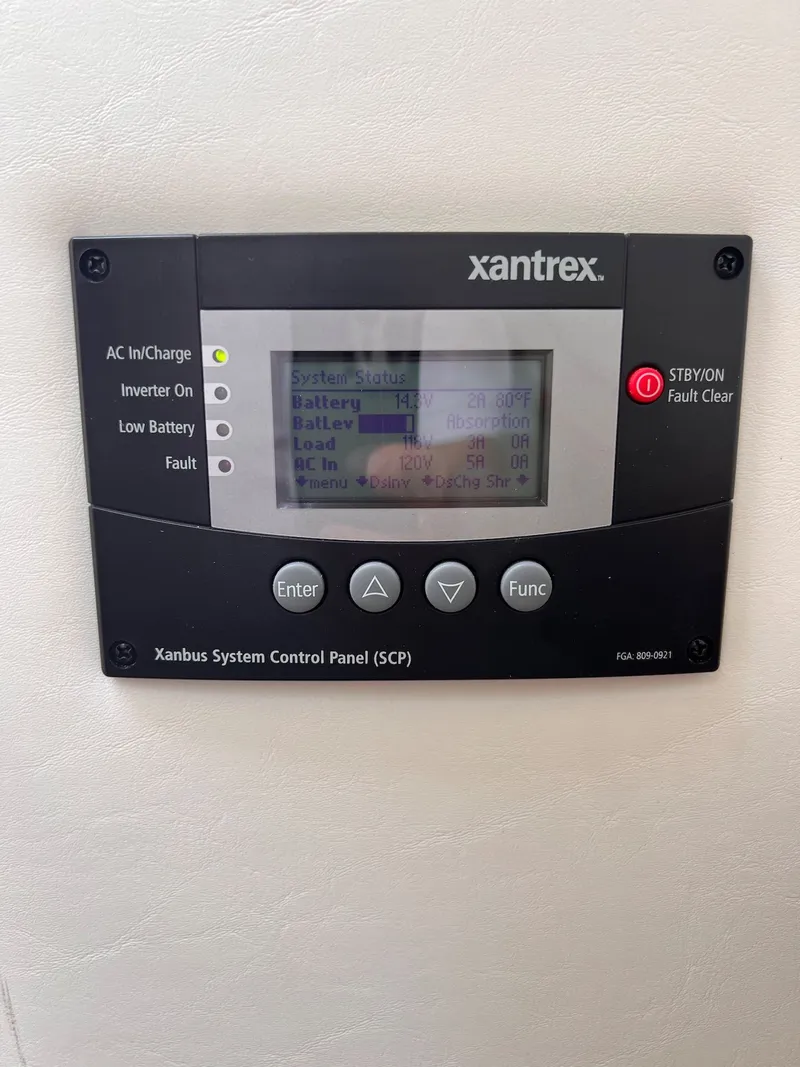 Slide: The Image of Xantrex system control panel on 2019 Cruisers Yachts 338 CX. - 28