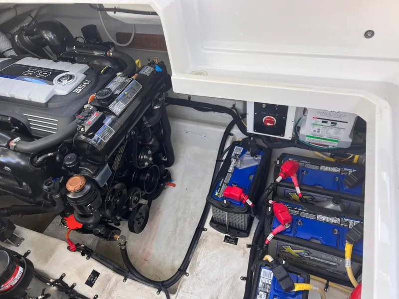 Slide: The Image of Engine compartment of 2019 Cruisers Yachts 338 CX South Beach Bow Rider. - 31