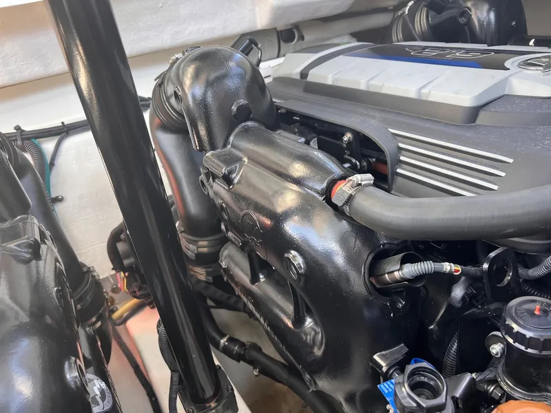 Slide: The Image of Engine compartment of 2019 Cruisers Yachts 338 CX Bow Rider. - 32