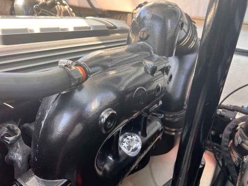 Slide: The Image of Engine of 2019 Cruisers Yachts 338 CX South Beach Bow Rider. - 33