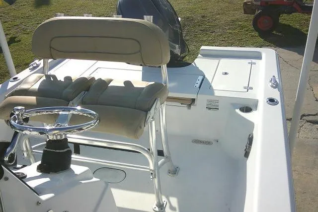 Slide: The Image of 2017 Sportsman Masters 207 Bay Boat interior with dual seats and steering wheel. - 18