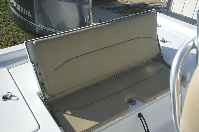 Slide: The Image of 2017 Sportsman Masters 207 Bay Boat with beige seating and Yamaha engine. - 26