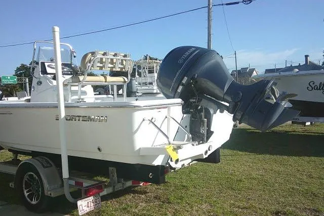 Slide: The Image of 2017 Sportsman Masters 207 Bay Boat on trailer, featuring Yamaha outboard motor. - 7