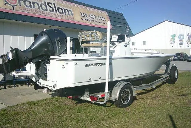 Slide: The Image of 2017 Sportsman Masters 207 Bay Boat on trailer outside dealership. - 9