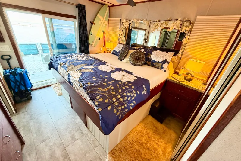 Slide: The Image of Luxurious bedroom in 2005 Twin Anchors 6816 Arizona Edition Yacht House with elegant decor. - 34