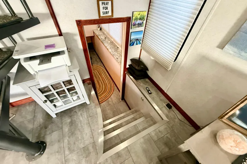 Slide: The Image of Interior of 2005 Twin Anchors 6816 Arizona Edition Yacht House with stairs and decor. - 35