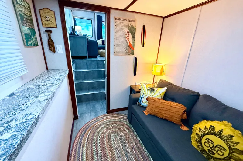 Slide: The Image of Cozy interior of 2005 Twin Anchors 6816 Arizona Edition Yacht House with decorative pillows and wall art. - 37