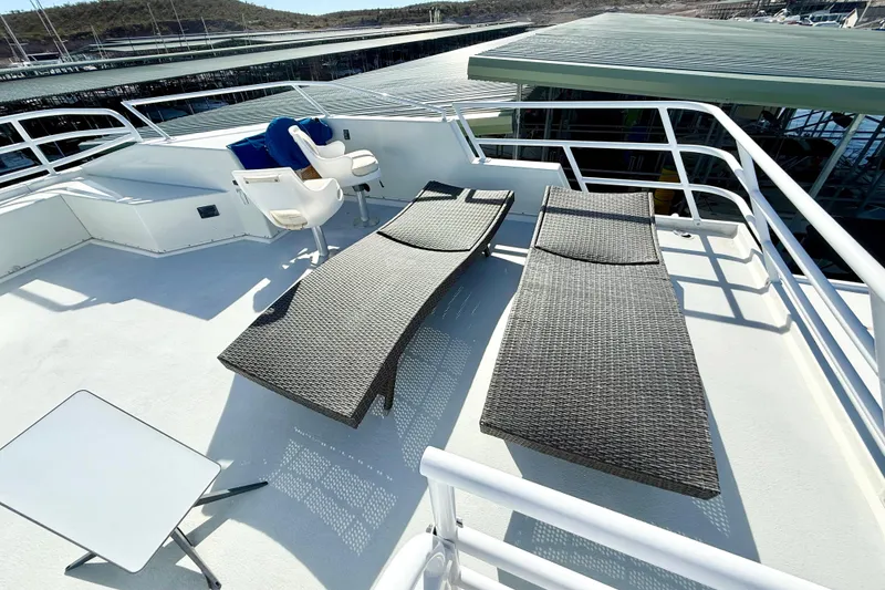 Slide: The Image of Rooftop deck of 2005 Twin Anchors 6816 Arizona Edition Yacht House with lounge chairs. - 53