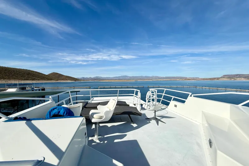 Slide: The Image of 2005 Twin Anchors 6816 Arizona Edition Yacht House on serene lake with mountain views. - 55