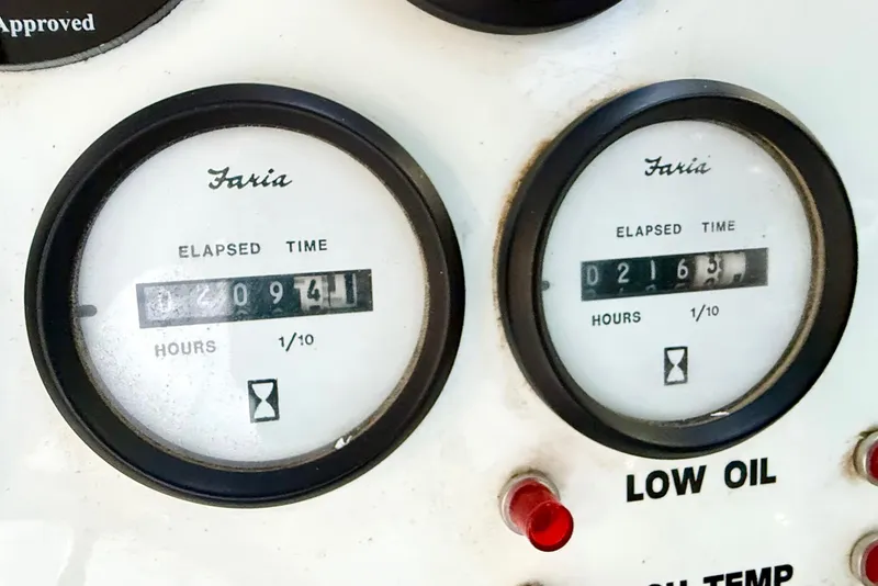 Slide: The Image of Elapsed time gauges on 2005 Twin Anchors 6816 Arizona Edition Yacht House dashboard. - 60